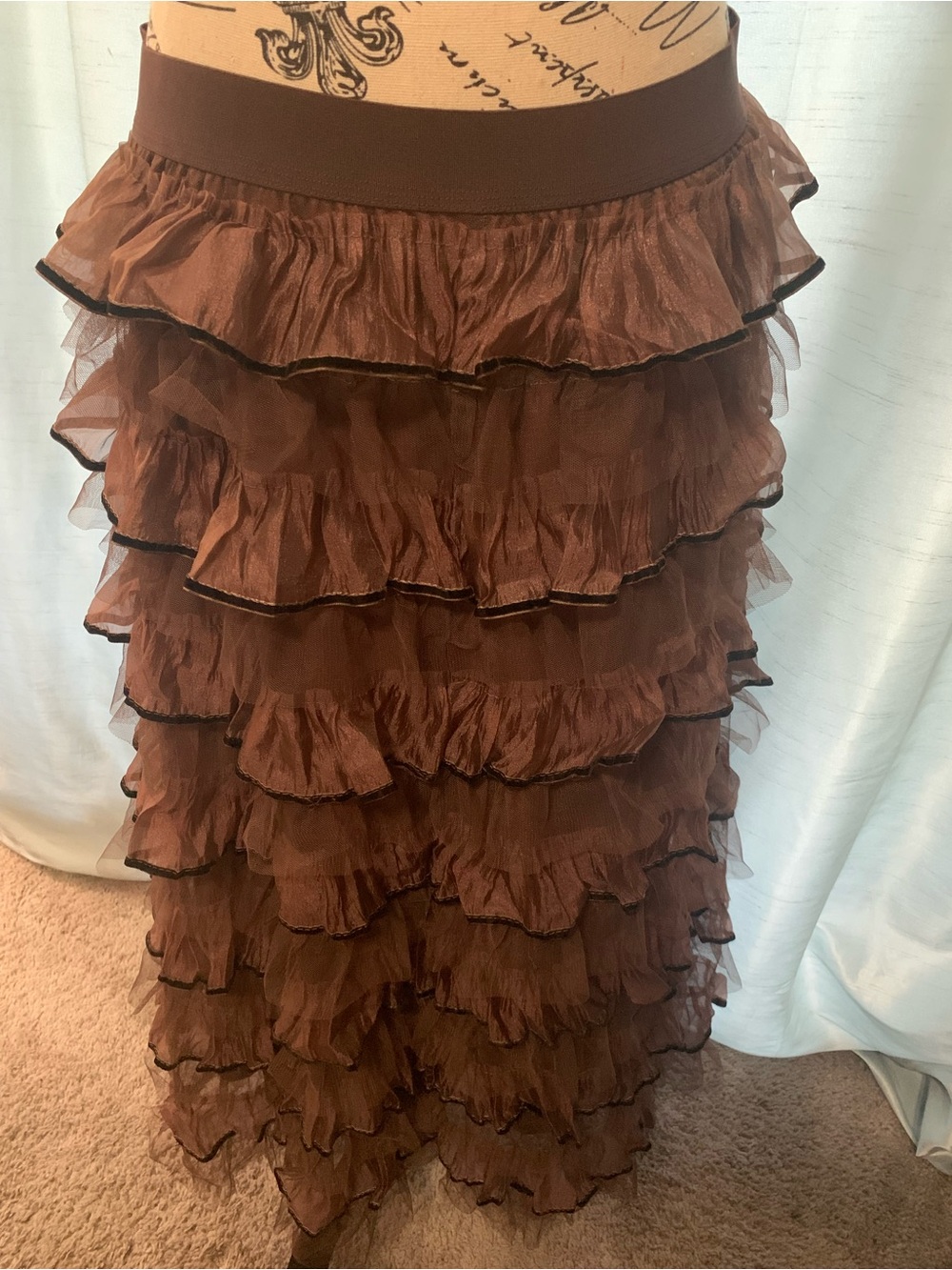 Mocha brown ruffle skirt with black pipe trim